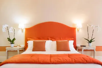 Letto o letti in una camera di B&B Cerretani Palace
