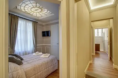 Letto o letti in una camera di Art Apartment Luxury Family suite