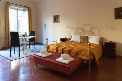 Letto o letti in una camera di Relais Accademia
