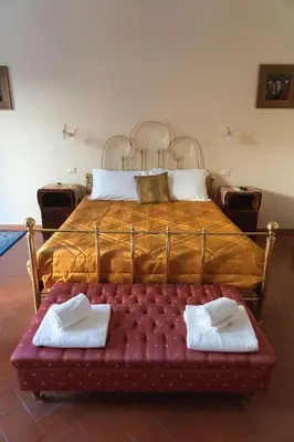 Letto o letti in una camera di Relais Accademia