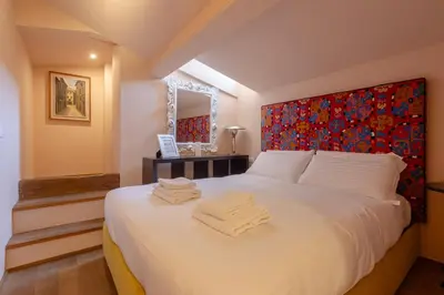 Letto o letti in una camera di Borgo Tegolaio Terrace