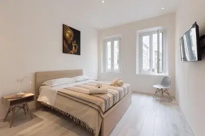 Letto o letti in una camera di Keys of Italy - Masai - Albero 2 - One bedroom flat 1st floor by train station
