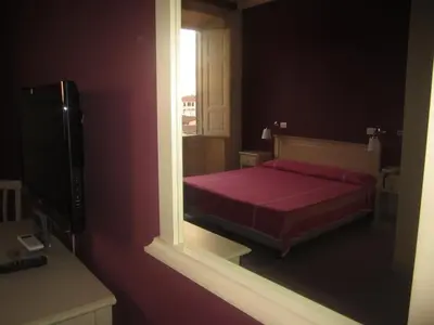 Letto o letti in una camera di Hotel Genzianella