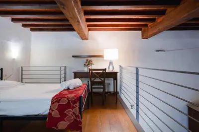 Letto o letti in una camera di Piazza Dei Ciompi With Private Garden