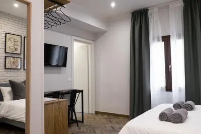 Letto o letti in una camera di The Gallery 42 Guest House