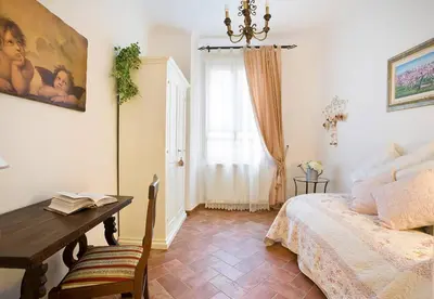 Letto o letti in una camera di Ellen's cozy apartment