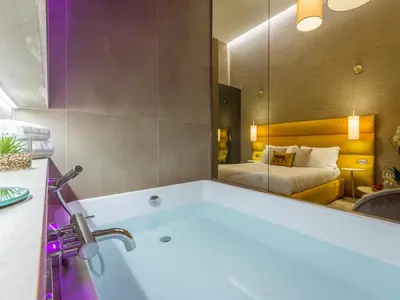 Letto o letti in una camera di Renascentia in Florence - Adults Only