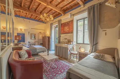 Letto o letti in una camera di Relais & Maison Grand Tour