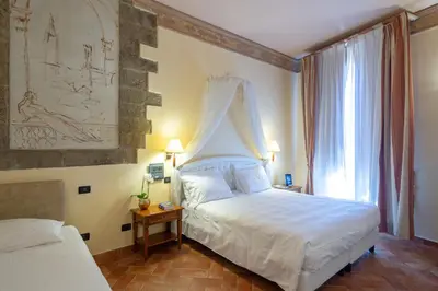 Letto o letti in una camera di Hotel Davanzati