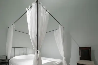 Letto o letti in una camera di Servi Suite