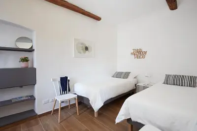Letto o letti in una camera di Casa Cosi - Maria Novella