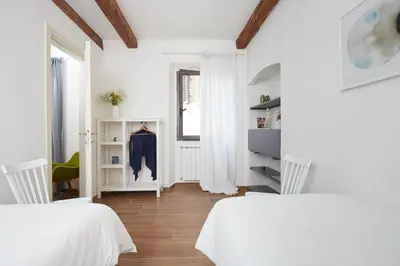 Letto o letti in una camera di Casa Cosi - Maria Novella