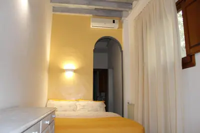 Letto o letti in una camera di Gmax Guelfa Apartments
