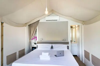 Letto o letti in una camera di hu Firenze Certosa camping in town
