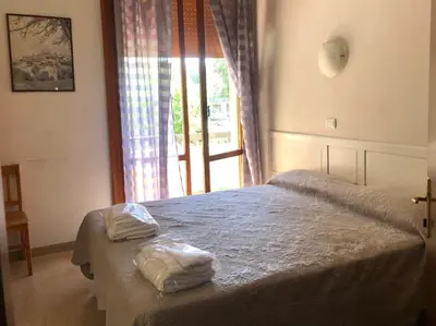 Letto o letti in una camera di Sansovino Bed and Car