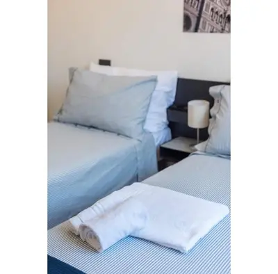 Letto o letti in una camera di Kate Apartment in centro 3 camere da letto 3 bagni