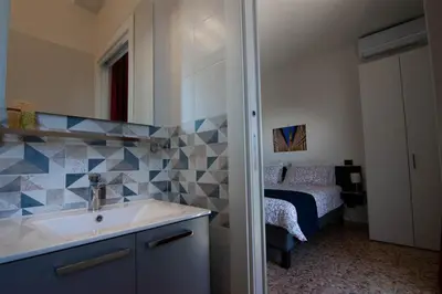 Letto o letti in una camera di Kate Apartment in centro 3 camere da letto 3 bagni