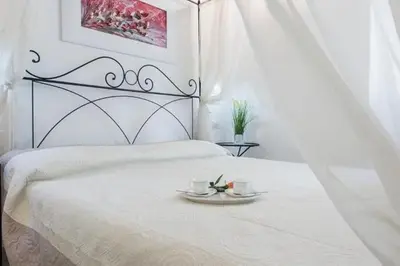Letto o letti in una camera di Little box house