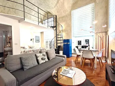Area soggiorno di Chic Mamma Deluxe Loft Suite
