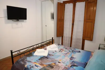 Letto o letti in una camera di Neri 1