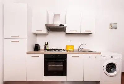 Cucina o angolo cottura di Historic center! Charming traditional Florentine building - AC,WiFi - By LikeHomeFlorence