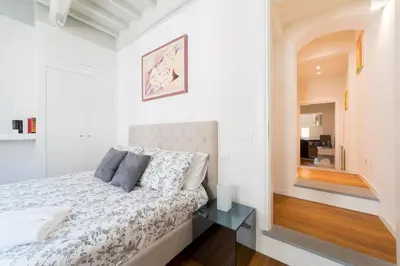 Letto o letti in una camera di San Niccolò hidden gem suite