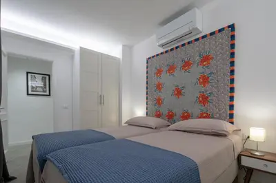 Letto o letti in una camera di Palace Downtown Florence