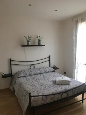 Letto o letti in una camera di Lulù