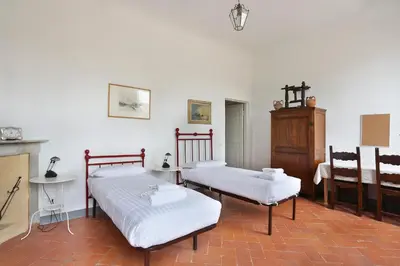 Letto o letti in una camera di Via della Chiesa Apartments