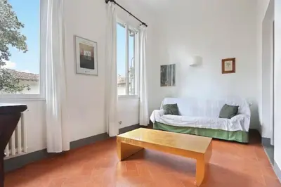 Letto o letti in una camera di Via della Chiesa Apartments