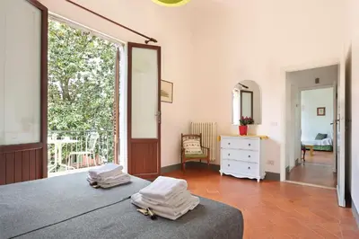 Letto o letti in una camera di Via della Chiesa Apartments