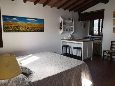 Letto o letti in una camera di Agriturismo Biologico Poggiopiano