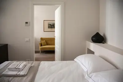 Letto o letti in una camera di Pietrapiana34 Boutique Apartments
