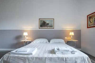 Letto o letti in una camera di Santa Maria Novella 4 bedrooms by Mmega