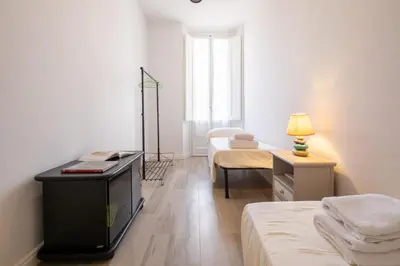 Letto o letti in una camera di Santa Maria Novella 4 bedrooms by Mmega