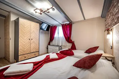 Letto o letti in una camera di HOTEL VENETO Centro Storico di Firenze