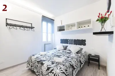 Letto o letti in una camera di DOMY'S GUEST HOUSE