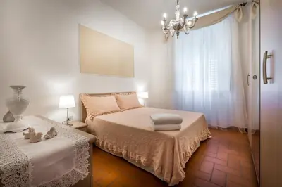 Letto o letti in una camera di Classic Tuscany Apartments by Mmega