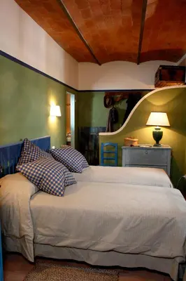 Letto o letti in una camera di I Veroni - Agriturismo and Wine Cellar