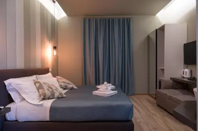 Letto o letti in una camera di GOGO` Petit Hotel