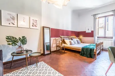 Letto o letti in una camera di Wine Apartments Florence Franciacorta