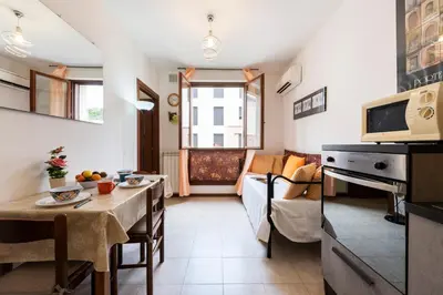 Cucina o angolo cottura di Castelnuovo Flat with Elevator and Free Parking