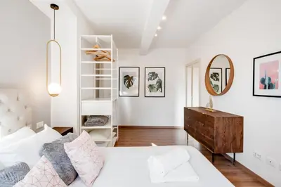 Letto o letti in una camera di GuestHost - Cozy Gem in Santa Croce