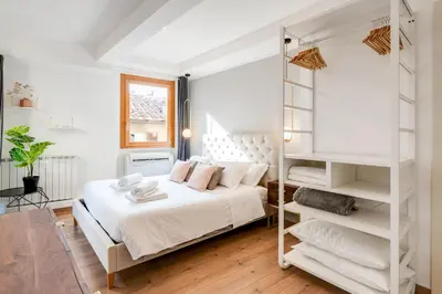 Letto o letti in una camera di GuestHost - Cozy Gem in Santa Croce