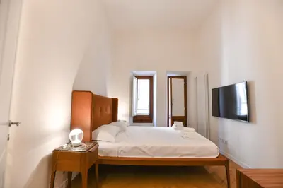 Letto o letti in una camera di Cappelle Medicee Luxury Flat