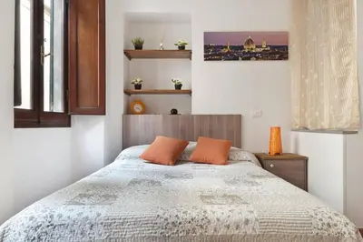 Letto o letti in una camera di Nice portion of property near Santa Croce