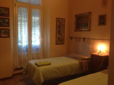 Letto o letti in una camera di LA BARRIERA affittacamere