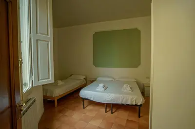 Letto o letti in una camera di Tranquil Suite Near Museums and Train Station