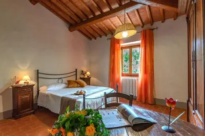 Letto o letti in una camera di Casale del Lago