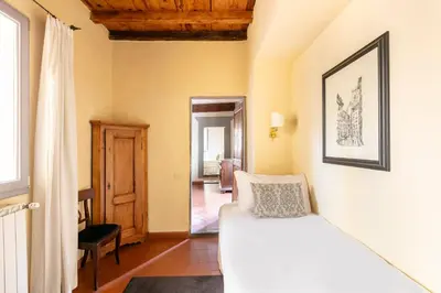 Letto o letti in una camera di Numa Florence Palazzo Belfiore
